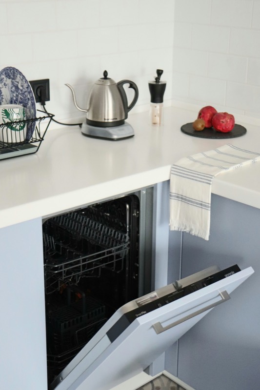 An open, emptied dishwasher